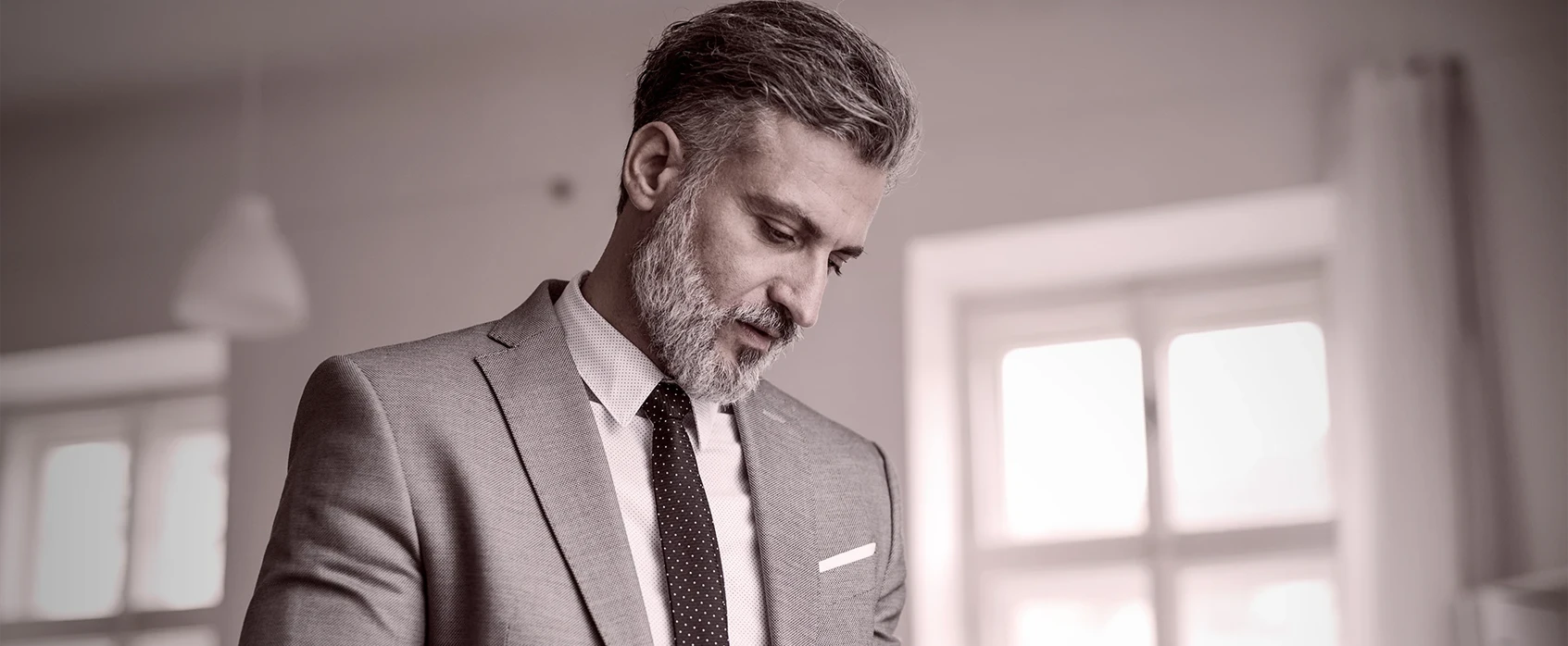 a mature businessman standing in an office using 2024 10 20 23 30 03 utc edited